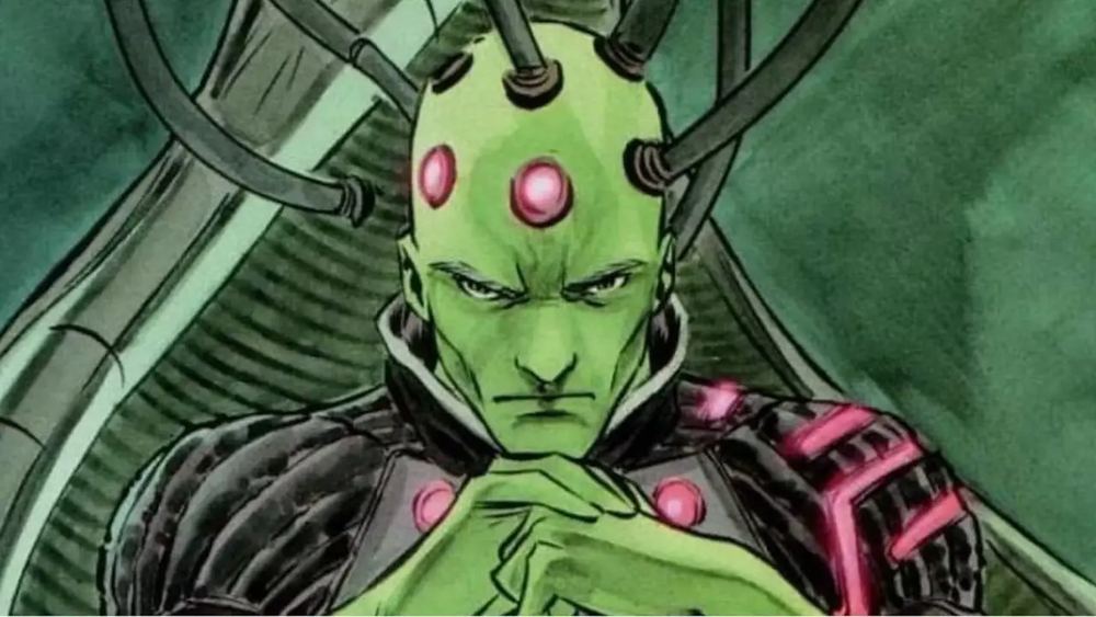 Brainiac, crâne vert constellé de nodules roses, à son poste de commande