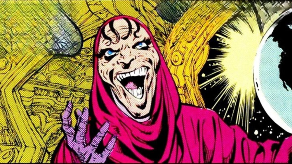 DeSaad en capuche magenta, le visage découvert, dans les comics