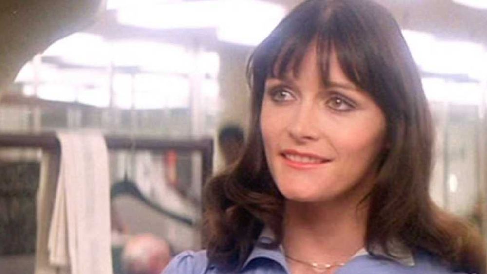 Margot Kidder en Lois Lane, chemisier bleu, dans Superman de 1978